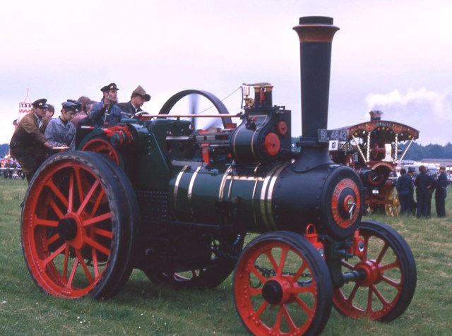 Burrell Traction Engine No. 2426 attempts the record for the largest number of people on the footplate. Could that be a young Colin Hatch by thebrake wheel? Banbury 1972.